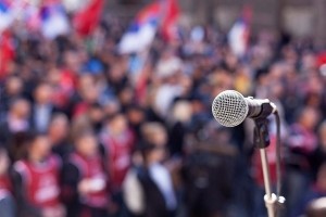 A microphone is in front of a crowd.