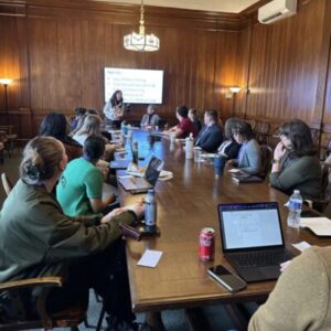 Image of annual conference session in board room