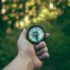 Image of a hand holding a compass