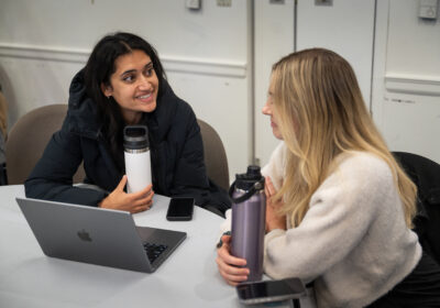 Two SAVIR attendees talking at the 2025 Annual Conference
