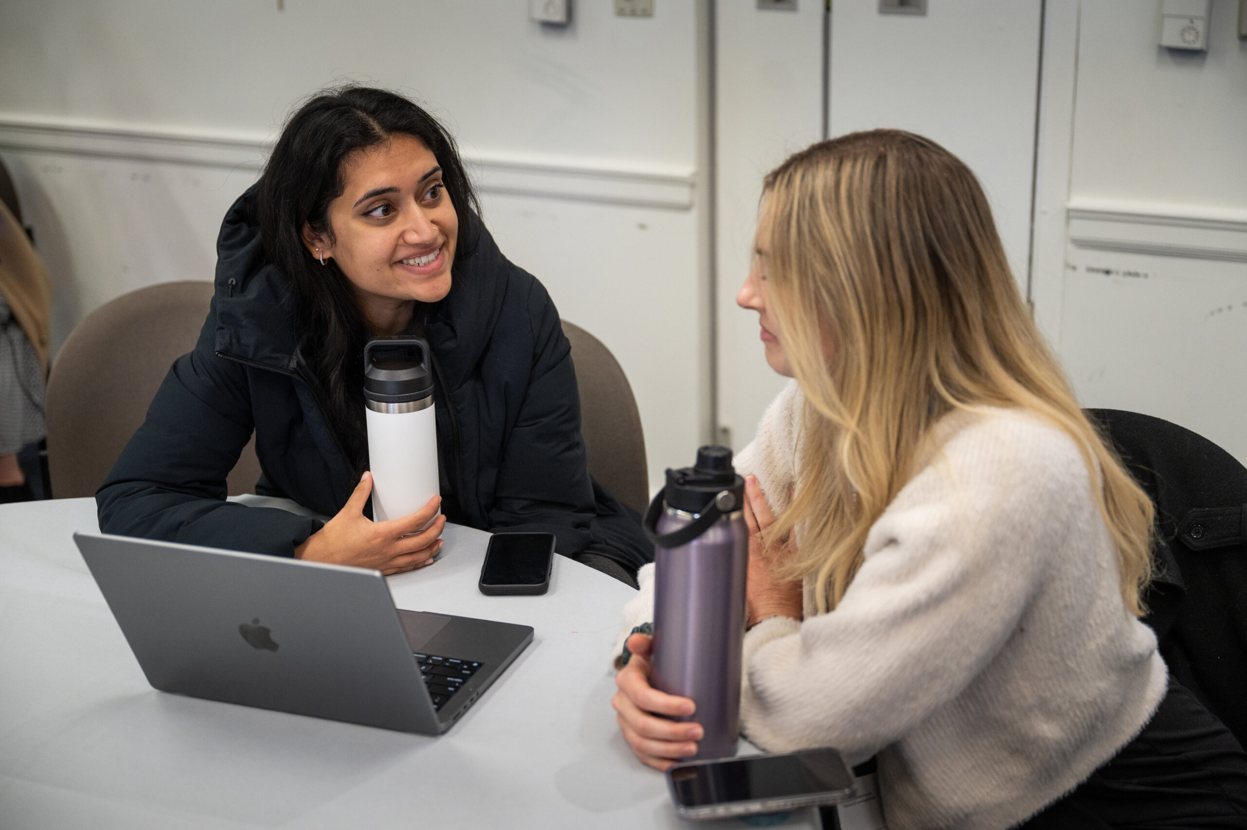 Two SAVIR attendees talking at the 2025 Annual Conference